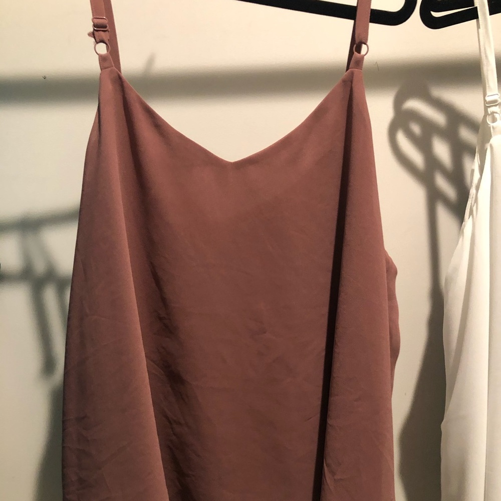 Swing tank